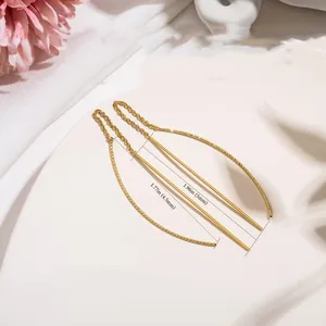 Elegant gold brass tassel threader earrings featuring long minimalist curved chain design