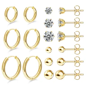 9-pair set of gold-plated brass earrings with cubic zirconia studs and hoop earrings