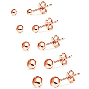 5-pair set of polished rose gold bead earrings in varying sizes on white background