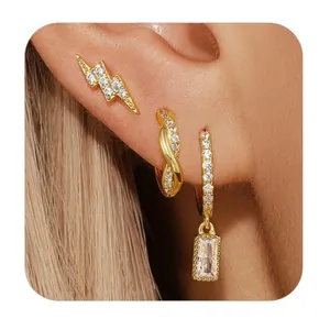 Set de pendientes de latón dorado con diseño de rayo y colgantes de cristal con pedrería