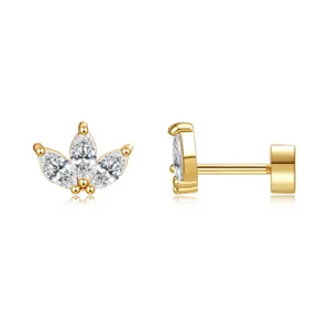 Macro detail of gold plated brass flower earrings with marquise-cut zircons and push-back