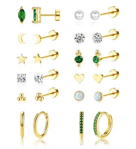 Set of 12 gold plated brass earrings featuring green zircon stars and moon designs