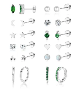 Set of 12 celestial earrings with green zircon, stars and moon in silver finish