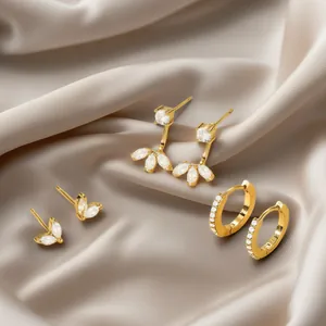 Elegant 18k gold plated brass earring set with zircon leaf studs and pavé hoop earrings