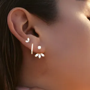 Gold plated brass earring set with cubic zirconia stones featuring marquise stud designs