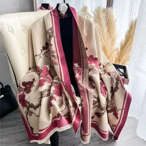 Sciarpa etnica floreale in finto cashmere con motivi jacquard vintage e nappine donna