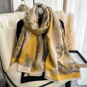 Macro detail of floral pattern on thick faux cashmere scarf with frayed fringe edges