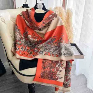 Close-up of floral cashmere feel scarf with vintage botanical patterns and fringe edge