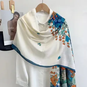 Off-white floral cotton linen shawl with colorful hand-painted flower patterns and blue borders