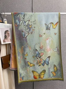 Close-up of butterfly pattern and soft fringe on this thick oil painting style shawl