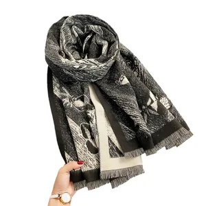 Sciarpa in cashmere con motivo a farfalla bianco e nero e bordi con frange