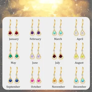 Set of 12 brass gold-plated birthstone teardrop earrings featuring small diamond accents