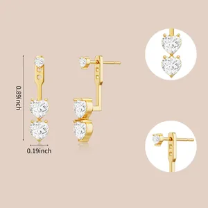 Detailed view of triple heart stud earrings with cubic zirconia in 18K gold plating