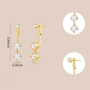 Macro detail of gold zircon earrings showing 0.89 inch length and adjustable closure