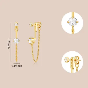 Detail view of gold drop earrings with cubic zirconia and exact size measurements