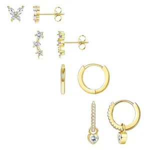 Ensemble de boucles d'oreilles dorées avec fleurs, papillons et incrustations de zircon