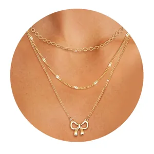 Three-layer gold-plated brass necklace set with butterfly pendant and round bead accents