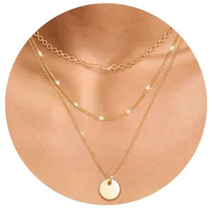Three-layer gold-plated bead chain necklace with polished round pendant and butterfly accent