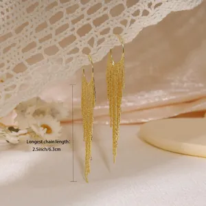 Vintage gold tassel earrings made of plated brass with linear fringe drops for women