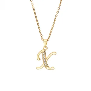 Detailed view of gold-plated cursive letter K pendant necklace with sparkling zircons