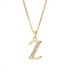 Macro detail of gold plated letter Z pendant necklace with sparkling zircon stones