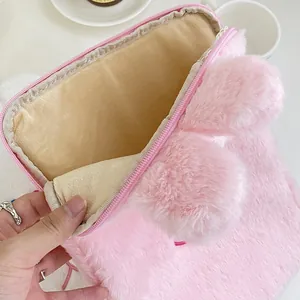 Pink plush rabbit tablet sleeve with cute ears and soft inner lining for iPad protection