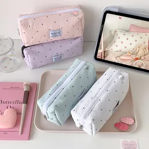 Pippetjes pennenzakken in pastelroze, paars, groen en wit voor school en kantoor