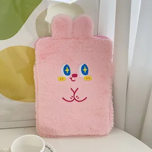 Close-up of pink plush iPad sleeve featuring cute rabbit ears and embroidered cartoon face