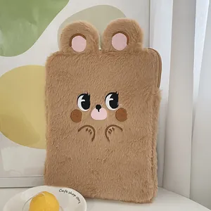 Detail of plush brown bear tablet sleeve with soft 3D ears and cute embroidery