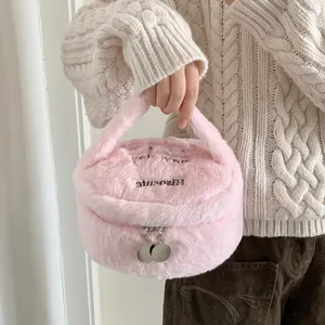 Neceser de peluche rosa con cremalleras dobles plateadas y asa de mano para viaje