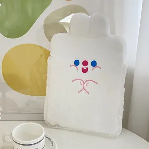Detailed view of white plush rabbit tablet bag featuring colorful cartoon embroidery