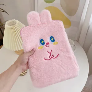 Detailed close-up of pink plush rabbit tablet sleeve with 3D ears and soft faux fur texture