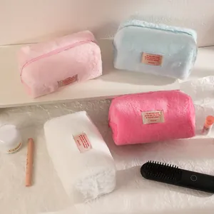 Large plush pencil case and cosmetic organizer bag in four pastel colors with soft fur