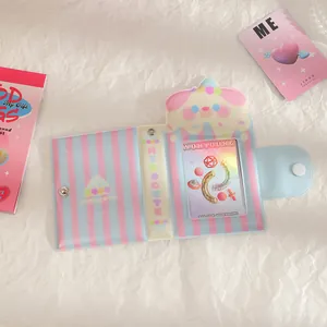 Detail view of pastel stripe photocard album with cute cartoon and snap button closure