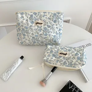 Set de trousses à maquillage matelassées à fleurs bleues pour voyage et rangement