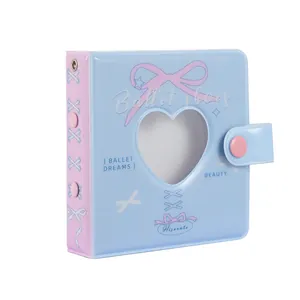 Detail view of pink and blue A8 binder with heart-shaped cutout and ballet theme