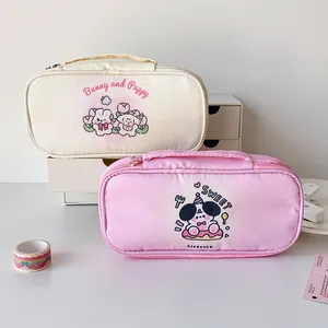 Detail of cute cartoon dog stationery bag with large capacity and portable handle