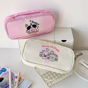 Close-up of large capacity cartoon puppy pencil bags with durable handles and zippers