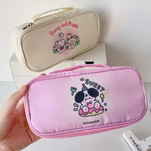 Detail of large capacity canvas pencil pouches with cute puppy and bunny patterns