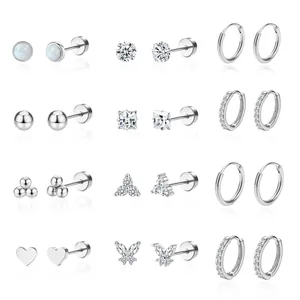 12 pairs of minimalist silver stud earrings set with opal and crystal in various designs