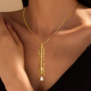 Elegant multi-layered gold plated necklace with wheat-leaf pendants and drop zircon