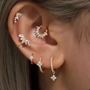 Gold plated brass earring set featuring floral zircon leaf design with cuff layering