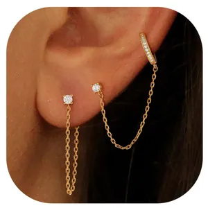 Modern brass gold-plated earring set with tassel chains and sparkling cubic zirconia stones
