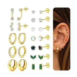 Detail of 18k gold plated earring set with colorful crystals and pearls on model