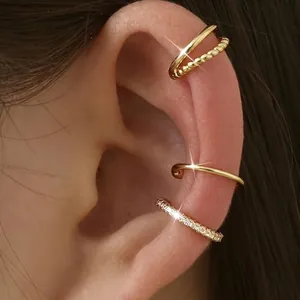 Σετ τριών επίχρυσων σκουλαρικιών earcuff με ζιργκόν pavé και μινιμαλιστικές γραμμές