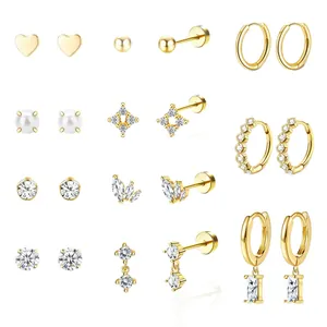 12-pair set of gold-plated brass stud earrings and hoops with pearls and zircons