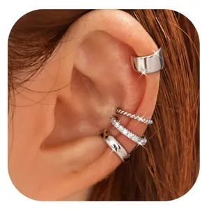 Close-up of silver-plated ear cuff set with twisted texture and crystal rhinestones