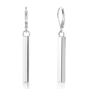 Macro detail of high-polish rectangular metal drop earrings with secure lever-back closure