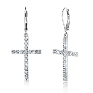 Macro shot of S925 sterling silver cross earrings with sparkling pavé zircon detail