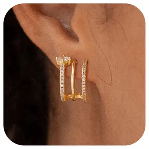 Three-row gold plated brass ear cuff featuring shimmering cubic zirconia pavé setting